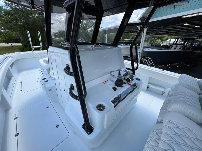 Slide: The Image of 2026 Invincible 36 Catamaran interior with sleek helm and seating. - 33