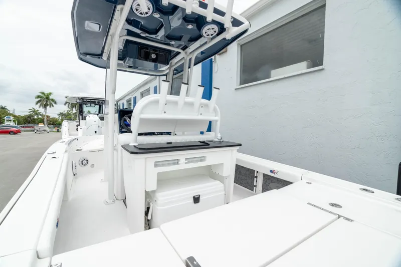 Slide: The Image of 2026 Crevalle 24 HCO boat, white interior, outdoor setting, modern design. - 12