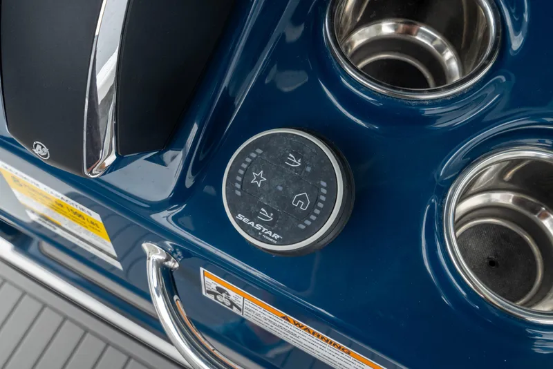 Slide: The Image of 2026 Crevalle 24 HCO boat console with SeaStar control and cup holders. - 29