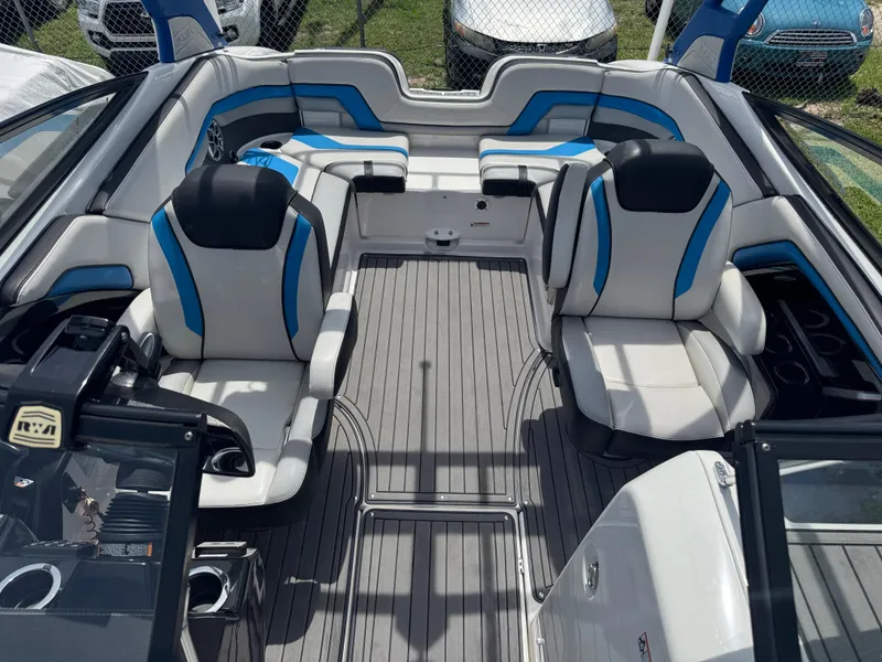 Slide: The Image of 2018 Yamaha Boats 242X E-Series interior with sleek seating and modern design. - 19