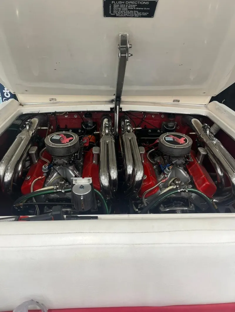 Slide: The Image of 1987 Cigarette 38 Top Gun boat engine compartment with dual engines. - 4