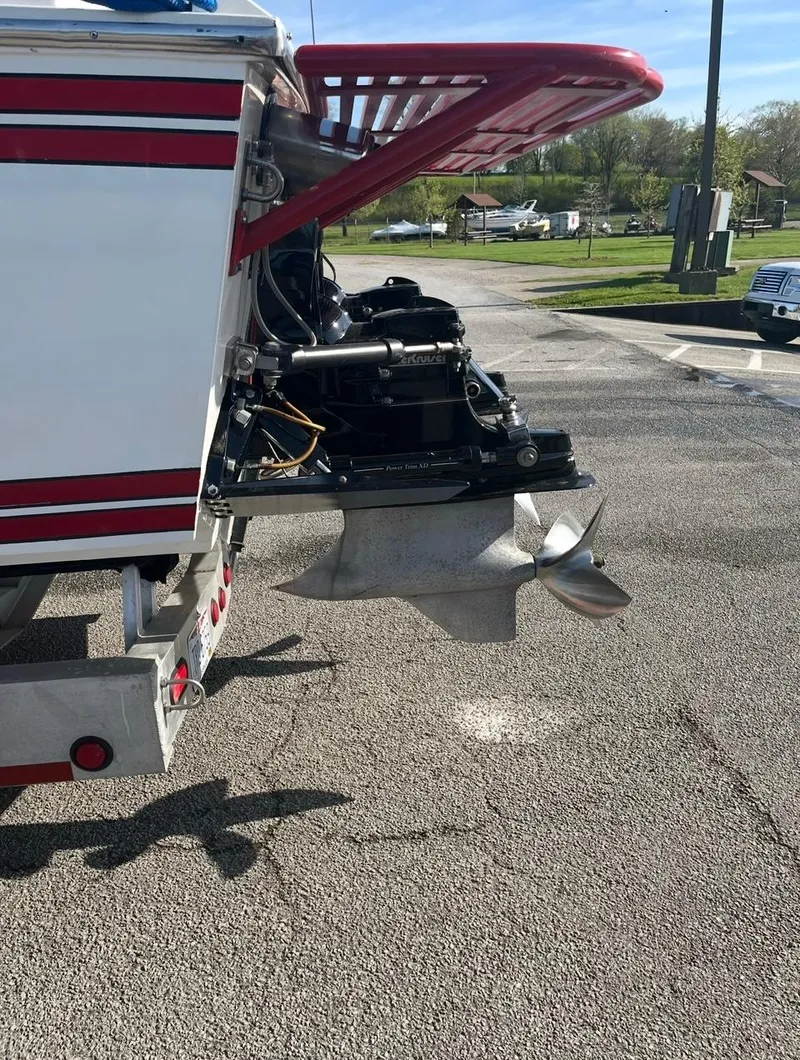 Slide: The Image of 1987 Cigarette 38 Top Gun boat propeller and stern detail in a parking lot. - 6