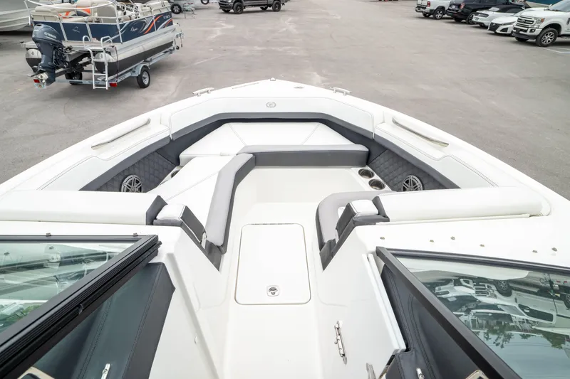 Slide: The Image of 2023 Cobalt R6 Outboard boat interior with spacious seating and modern design. - 11