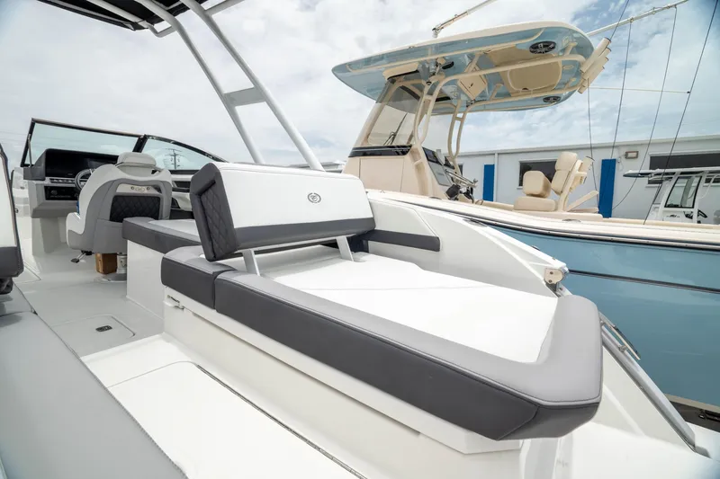 Slide: The Image of 2023 Cobalt R6 Outboard boat with sleek seating and modern design. - 15