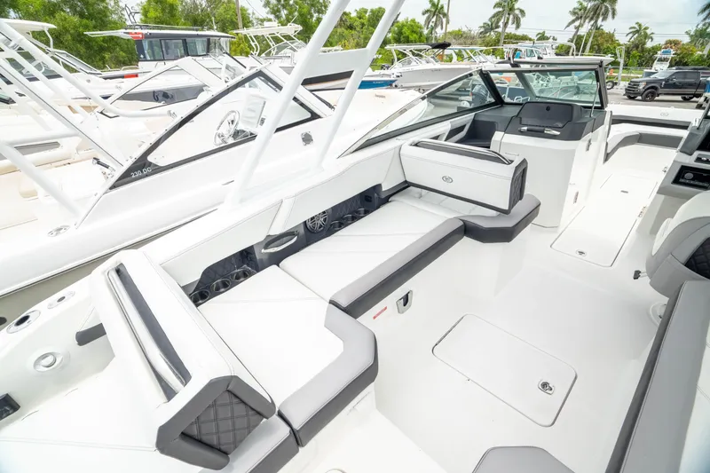 Slide: The Image of 2023 Cobalt R6 Outboard boat interior with sleek seating and modern design. - 16