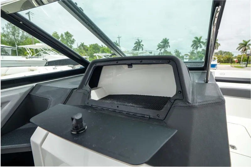 Slide: The Image of 2023 Cobalt R6 Outboard dashboard with storage compartment, featuring sleek design and modern functionality. - 30