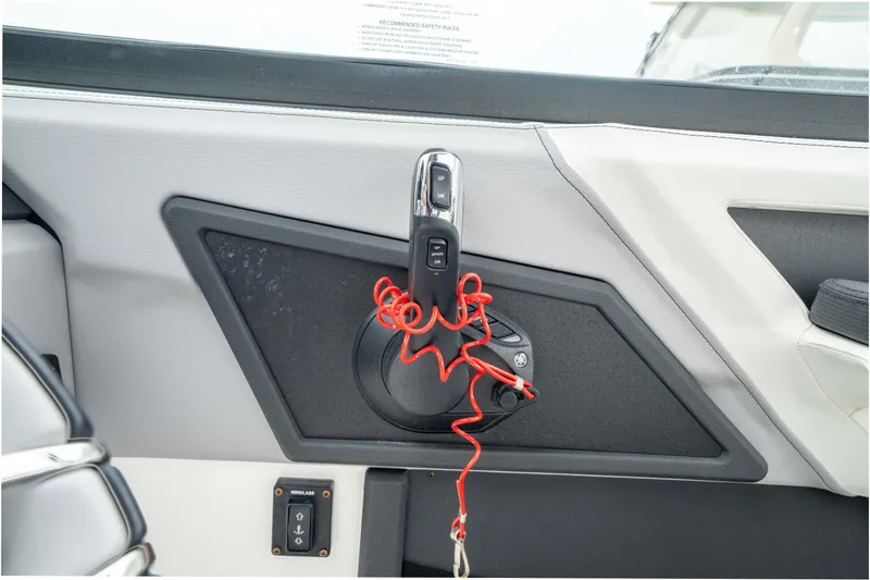 Slide: The Image of Interior of 2023 Cobalt R6 Outboard boat with safety lanyard and control panel. - 33