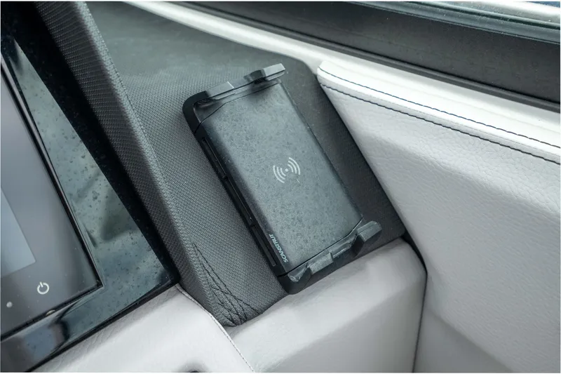 Slide: The Image of 2023 Cobalt R6 Outboard dashboard with wireless charging pad. - 35