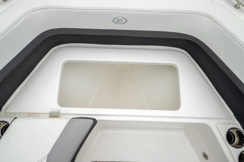 Slide: The Image of 2023 Cobalt R6 Outboard boat interior with seating and storage compartment. - 45
