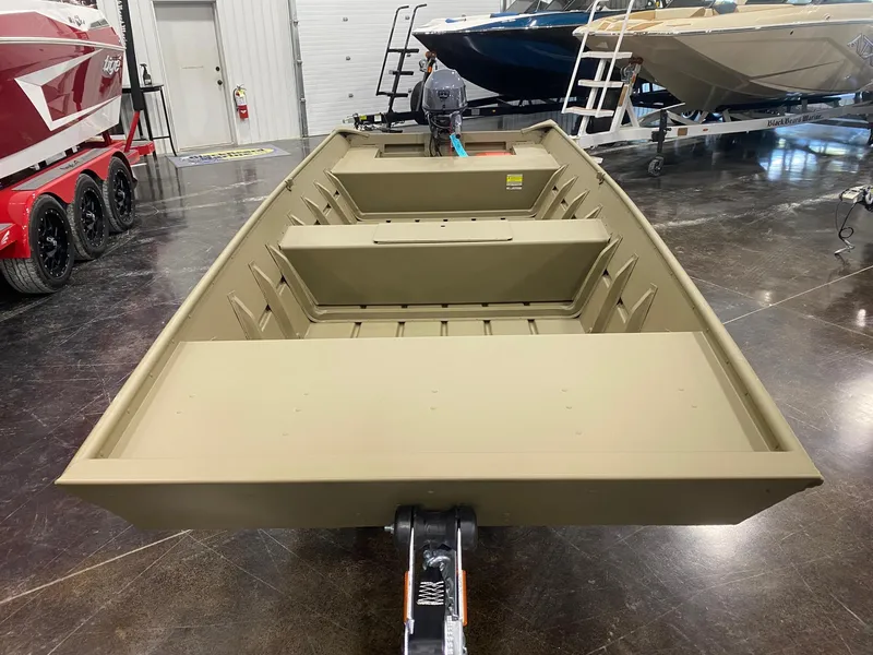 Slide: The Image of 2025 G3 Gator Tough 1648 LW boat in showroom, featuring durable aluminum construction. - 1