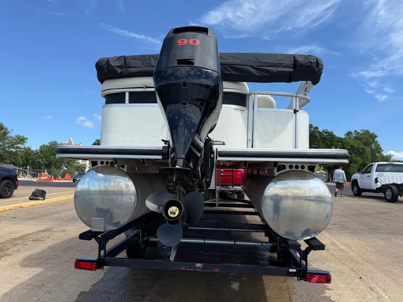 Slide: The Image of 2011 Sun Tracker Regency Party Barge 22 on trailer with Mercury outboard motor. - 12