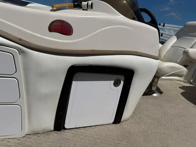 Slide: The Image of 2011 Sun Tracker Regency Party Barge 22 interior with storage drawers and seating. - 42