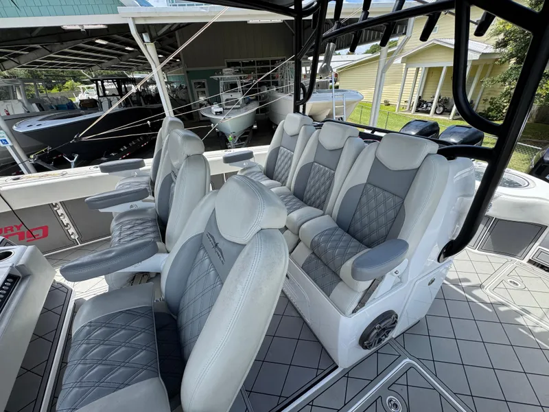 Slide: The Image of Luxurious seating on 2020 Invincible 40 Catamaran, featuring plush, diamond-stitched upholstery. - 31