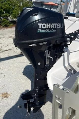 Slide: The Image of Tohatsu FourStroke outboard motor on a 2012 Corsair Dash 750 sailboat. - 2