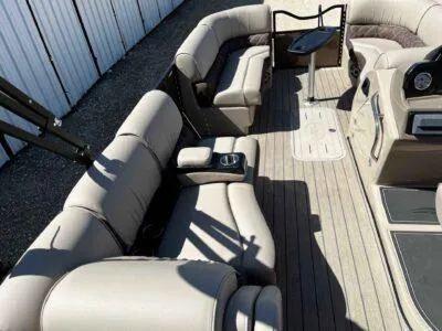 Slide: The Image of 2025 SunCatcher Elite 324 SS boat interior with luxurious seating and modern design. - 10