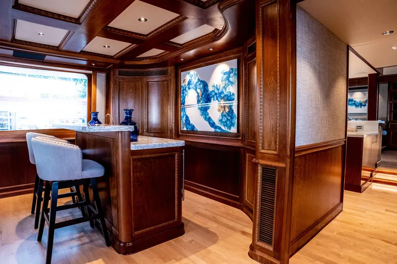 Slide: The Image of Luxurious 1993 Queenship LRC yacht interior with elegant wood paneling and modern decor. - 24