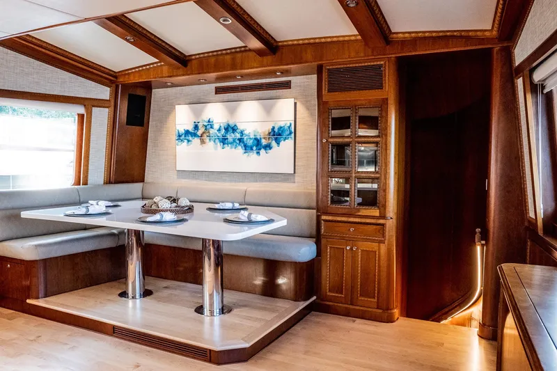 Slide: The Image of Luxurious 1993 Queenship LRC yacht interior with elegant dining area and modern decor. - 35
