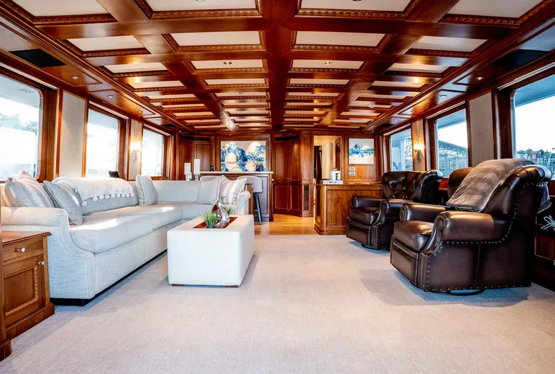 Slide: The Image of Luxurious 1993 Queenship LRC yacht interior with elegant wood paneling and plush seating. - 36