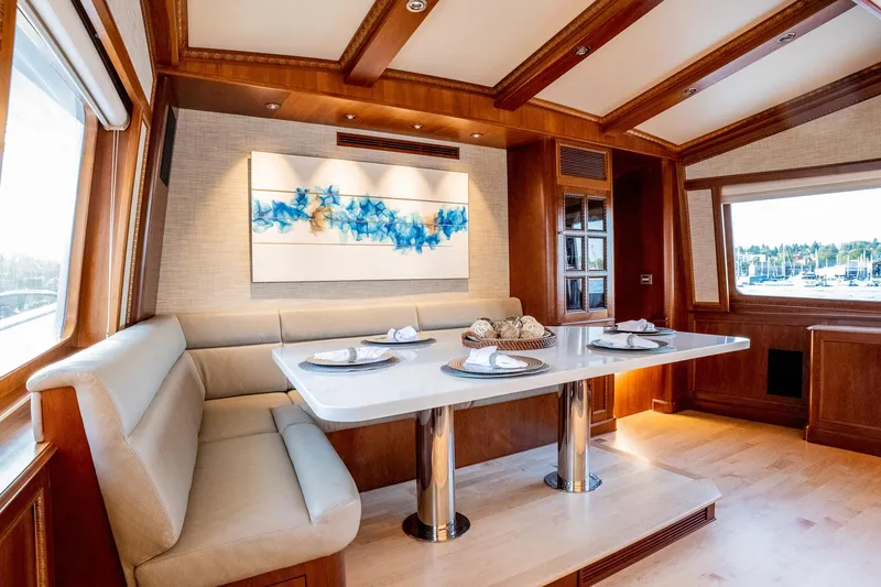Slide: The Image of Luxurious 1993 Queenship LRC yacht interior with elegant dining area and modern decor. - 44
