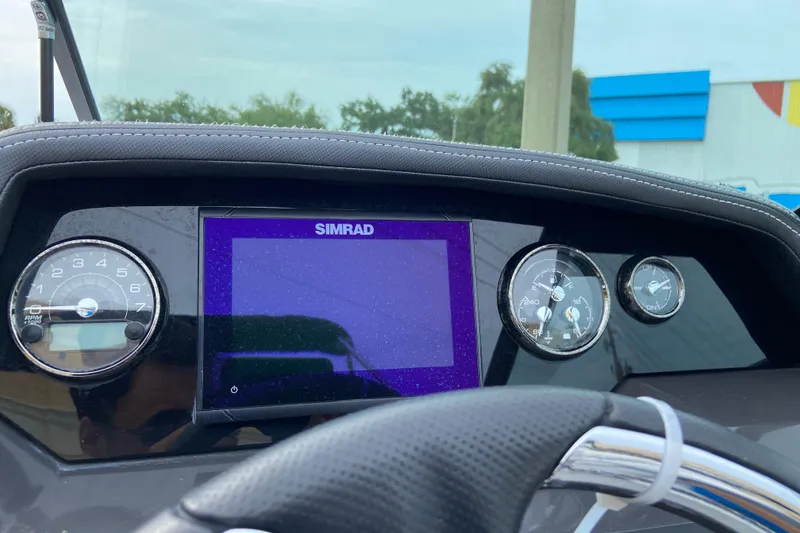 Slide: The Image of Dashboard of 2025 Monterey M-45 boat with Simrad display and gauges. - 18
