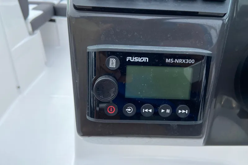 Slide: The Image of Fusion MS-NRX300 audio system on 2025 Monterey M-45 boat dashboard. - 19