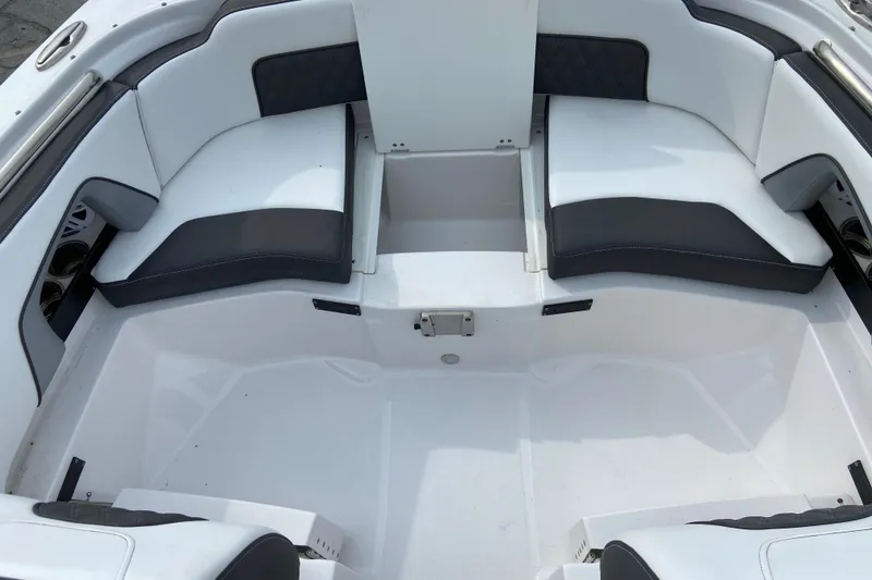Slide: The Image of Interior of 2025 Monterey M-45 boat with white and black seating arrangement. - 29