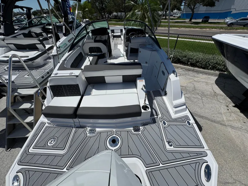 Slide: The Image of 2025 Monterey M-45 boat with sleek seating and modern design, displayed outdoors. - 3