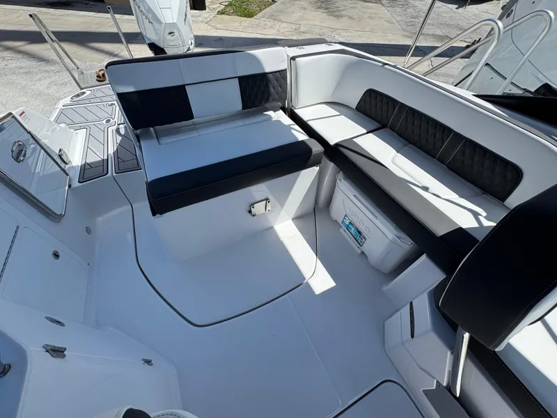 Slide: The Image of 2025 Monterey M-45 boat interior with sleek seating and modern design. - 4