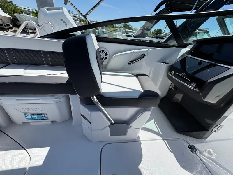 Slide: The Image of Interior of 2025 Monterey M-45 boat, featuring sleek seating and modern dashboard design. - 6