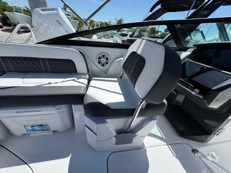 Slide: The Image of Interior of 2025 Monterey M-45 boat with modern seating and dashboard. - 7
