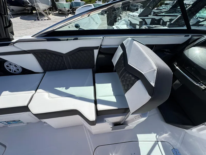 Slide: The Image of Luxurious interior of 2025 Monterey 255SS boat with stylish seating and modern design. - 12