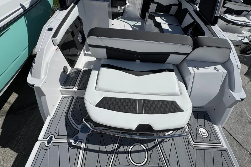 Slide: The Image of 2025 Monterey 255SS boat interior with stylish seating and modern design. - 24