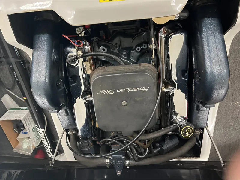 Slide: The Image of 1990 American Skier Legend engine, detailed view, showcasing components and branding. - 4