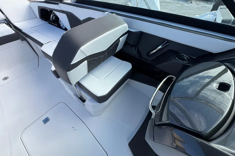 Slide: The Image of Interior of 2025 Monterey 255SS boat with sleek seating and modern design. - 9