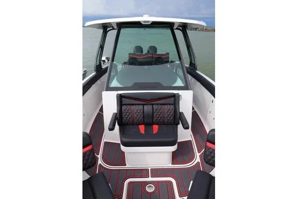 Slide: The Image of 2026 Monterey Elite 30 OB boat interior with modern seating and sleek design. - 3