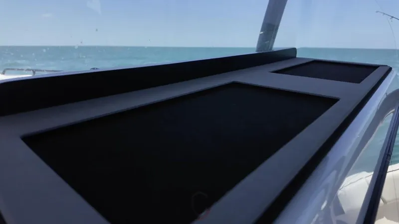 Slide: The Image of 2023 CG Boat Works 35 M-Series dashboard with ocean view. - 20