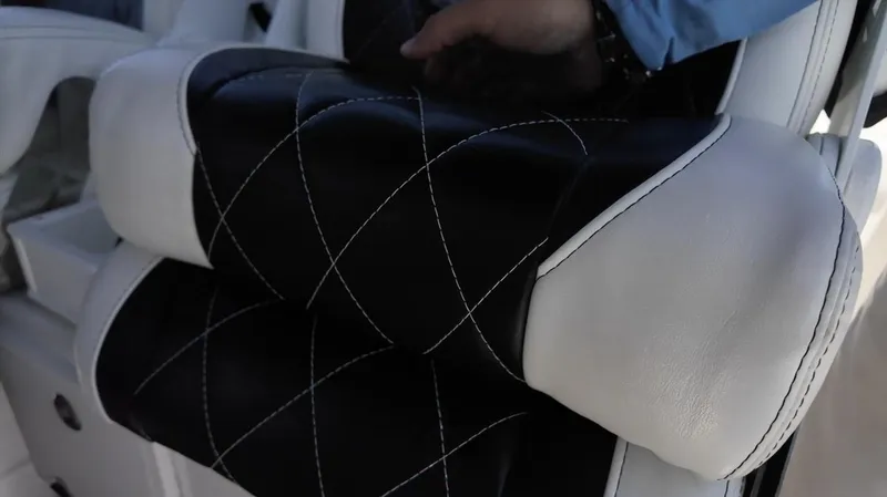 Slide: The Image of Luxurious black and white leather seating on 2023 CG Boat Works 35 M-Series. - 24