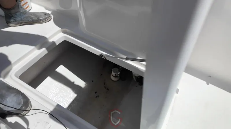 Slide: The Image of Open compartment on 2023 CG Boat Works 35 M-Series deck, showing interior details. - 29
