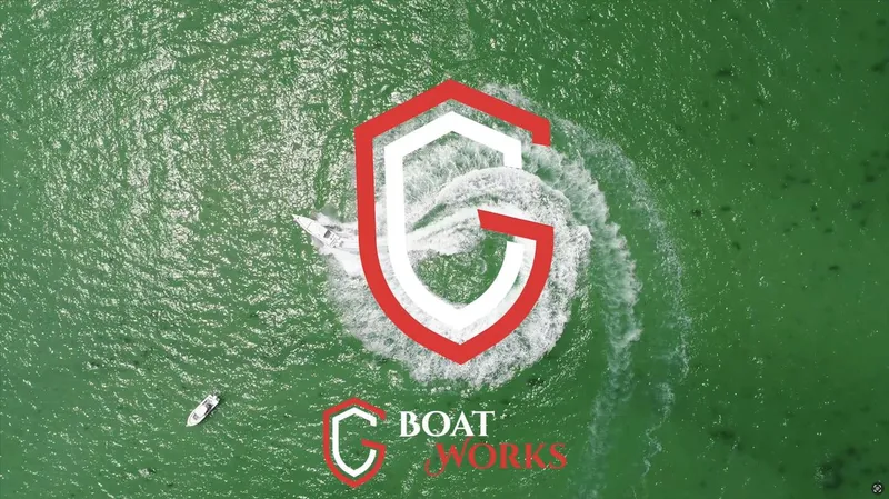 Slide: The Image of Aerial view of CG Boat Works 2023 35 M-Series on green water. - 4