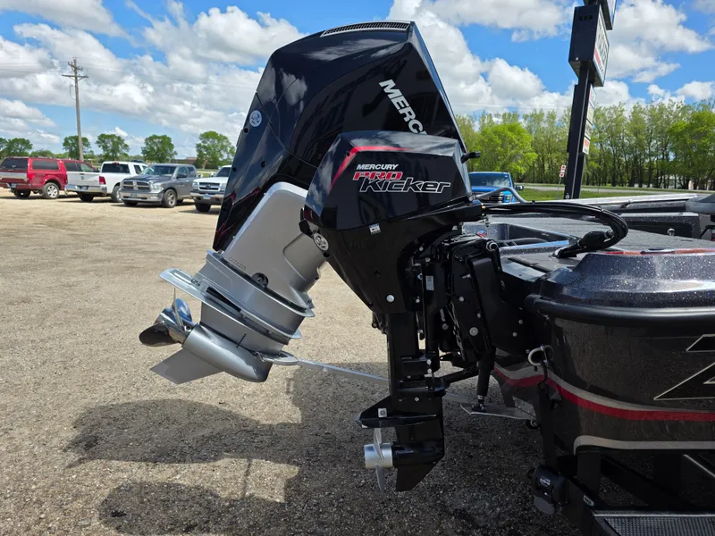 Slide: The Image of Outboard motor on a 2025 Nitro ZV-20 SPORT boat, parked outdoors. - 3