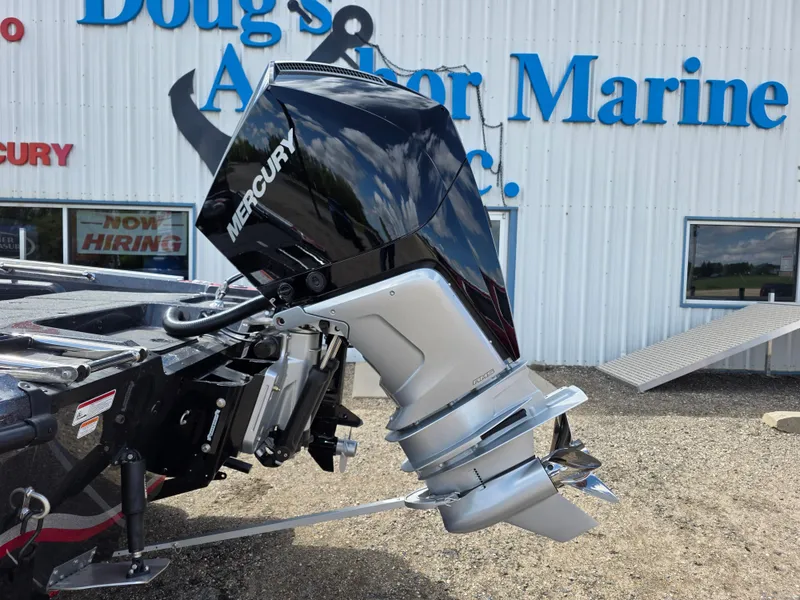 Slide: The Image of Outboard motor on a 2025 Nitro ZV-20 SPORT boat at a marine dealership. - 4