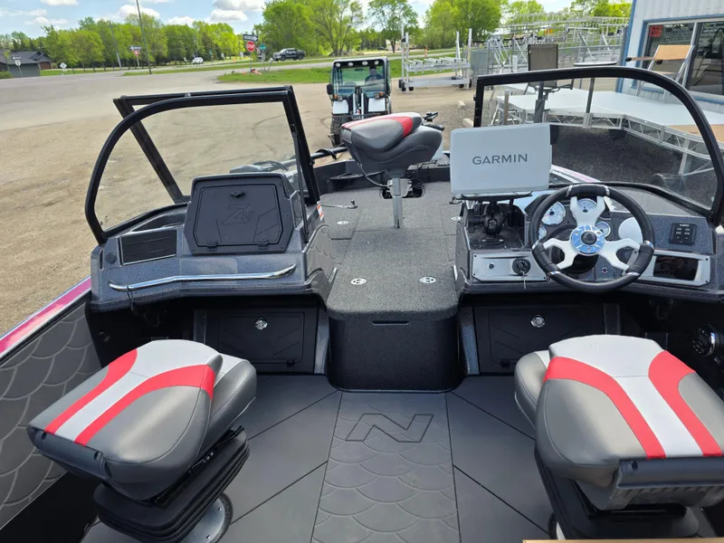 Slide: The Image of 2025 Nitro ZV-20 SPORT boat interior with Garmin navigation system and stylish seating. - 7