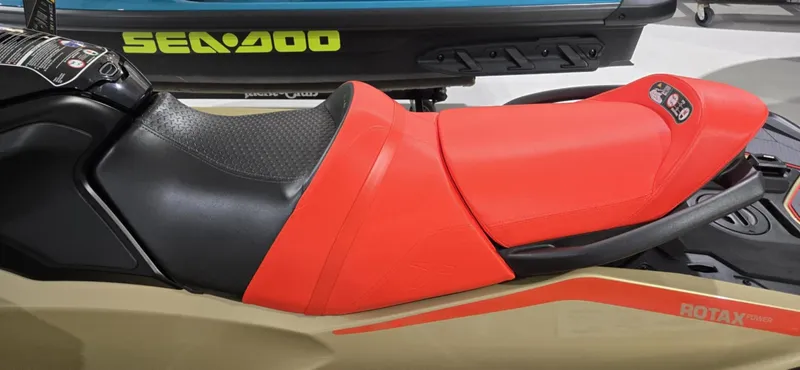 Slide: The Image of 2025 Sea-Doo RXT-X 325 jet ski with red and black seat design. - 10