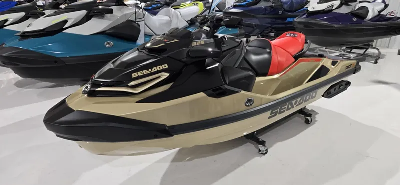Slide: The Image of 2025 Sea-Doo RXT-X 325 jet ski with red seat, displayed in showroom. - 3