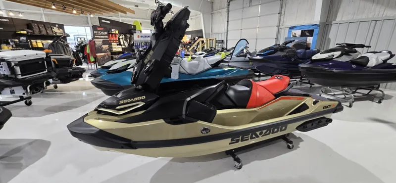 Slide: The Image of 2025 Sea-Doo RXT-X 325 jet ski displayed in a showroom. - 5