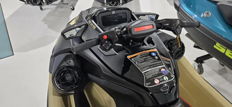 Slide: The Image of 2025 Sea-Doo RXT-X 325 jet ski dashboard and controls, showcasing modern design and features. - 9