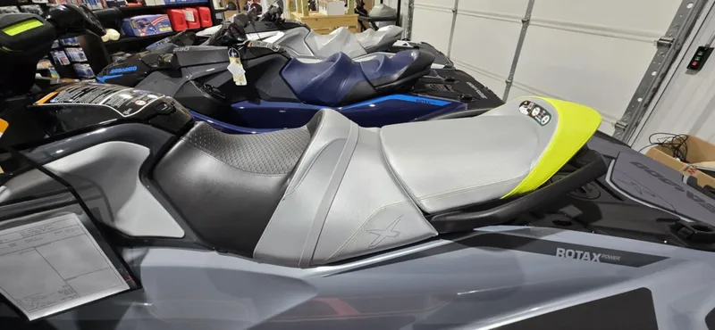 Slide: The Image of 2025 Sea-Doo RXT-X 325 jet ski with sleek design and comfortable seating. - 3