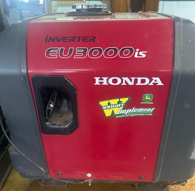 Slide: The Image of Honda EU3000is inverter generator with Wright Implement and John Deere logos. - 22