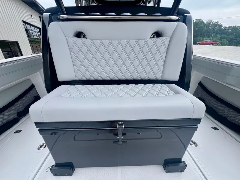 Slide: The Image of 2025 Nor-Tech 340 Sport Center Console, featuring luxurious diamond-stitched seating. - 10