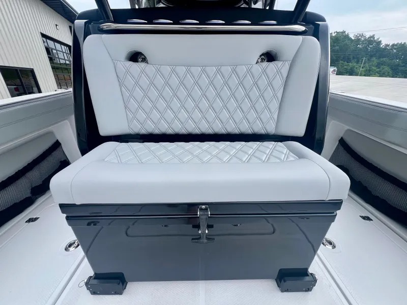 Slide: The Image of 2025 Nor-Tech 340 Sport Center Console, luxurious seating with diamond stitching. - 11
